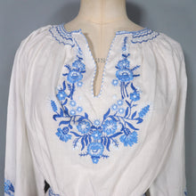 Load image into Gallery viewer, 70s WHITE HUNGARIAN FOLK BLOUSE WITH BLUE FLORAL EMBROIDERY - S