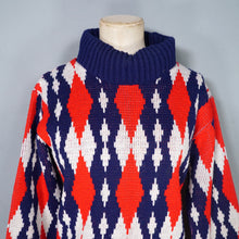 Load image into Gallery viewer, 60s STANLEY HENWOOD BLUE RED AND WHITE DIAMOND PATTERN ROLL NECK JUMPER - S-M