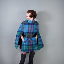 Load image into Gallery viewer, 70s JIMMY HOURIHAN "BORU" LIGHT BLUE, PINK AND GREEN PLAID WOOL CAPE - S-M