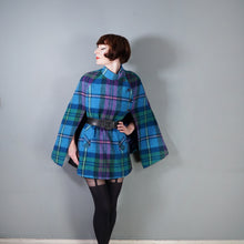 Load image into Gallery viewer, 70s JIMMY HOURIHAN "BORU" LIGHT BLUE, PINK AND GREEN PLAID WOOL CAPE - S-M
