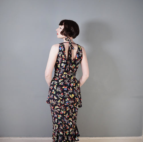 LATE 30s BLACK TIERED PEPLUM BIAS CUT DRESS WITH COLOURFUL FLORAL PRINT - XS