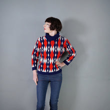 Load image into Gallery viewer, 60s STANLEY HENWOOD BLUE RED AND WHITE DIAMOND PATTERN ROLL NECK JUMPER - S-M