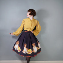 Load image into Gallery viewer, 50s BLACK NOVELTY DOG AND HAT BORDER PRINT FULL COTTON SKIRT - 26"