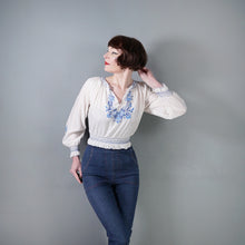 Load image into Gallery viewer, 70s WHITE HUNGARIAN FOLK BLOUSE WITH BLUE FLORAL EMBROIDERY - S