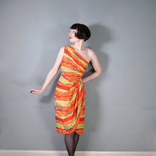 Load image into Gallery viewer, 50s FIREY RED ORANGE AND CHARTREUSE ONE SHOULDER HAWAIIAN DRESS WITH SHOULDER CAPE - S