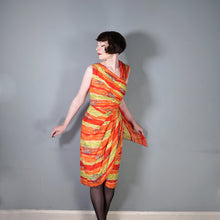 Load image into Gallery viewer, 50s FIREY RED ORANGE AND CHARTREUSE ONE SHOULDER HAWAIIAN DRESS WITH SHOULDER CAPE - S