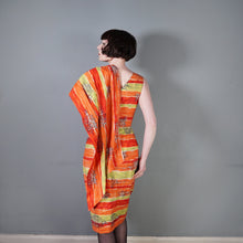 Load image into Gallery viewer, 50s FIREY RED ORANGE AND CHARTREUSE ONE SHOULDER HAWAIIAN DRESS WITH SHOULDER CAPE - S