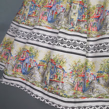 Load image into Gallery viewer, 50s WHITE COTTON FULL SKIRT WITH SCENIC PASTEL VILLAGE STREET PRINT - 25"