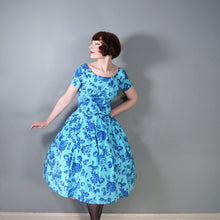 Load image into Gallery viewer, 50s SAMBO FASHIONS BLUE AND TURQUOISE FLORAL ROSE PRINT COTTON DRESS - M-L