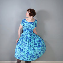 Load image into Gallery viewer, 50s SAMBO FASHIONS BLUE AND TURQUOISE FLORAL ROSE PRINT COTTON DRESS - M-L