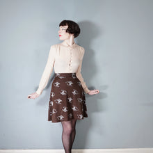 Load image into Gallery viewer, 70s BROWN WHITE PONTE KNIT NOVELTY LADY PATTERN SKIRT - 25.5&quot;