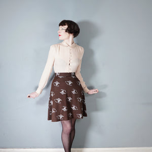 70s BROWN WHITE PONTE KNIT NOVELTY LADY PATTERN SKIRT - 25.5"