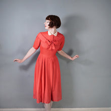 Load image into Gallery viewer, 40s CORAL SILKY RAYON TEA DRESS WITH BOW AND PETER PAN COLLAR - M