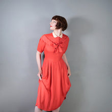 Load image into Gallery viewer, 40s CORAL SILKY RAYON TEA DRESS WITH BOW AND PETER PAN COLLAR - M