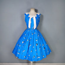 Load image into Gallery viewer, 50s BLUE WHIMSICAL NOVELTY PRINT DRESS WITH FULL SKIRT AND SHAWL NECK - S