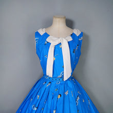 Load image into Gallery viewer, 50s BLUE WHIMSICAL NOVELTY PRINT DRESS WITH FULL SKIRT AND SHAWL NECK - S