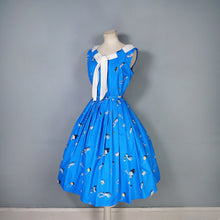 Load image into Gallery viewer, 50s BLUE WHIMSICAL NOVELTY PRINT DRESS WITH FULL SKIRT AND SHAWL NECK - S