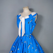 Load image into Gallery viewer, 50s BLUE WHIMSICAL NOVELTY PRINT DRESS WITH FULL SKIRT AND SHAWL NECK - S