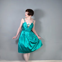 Load image into Gallery viewer, 60s BLANES GREEN SATIN COCKTAIL DRESS WITH FLORAL APPLIQUE BUST - S