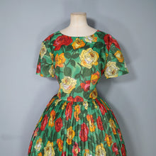 Load image into Gallery viewer, 60s COLOURFUL BRIGHT GREEN RED AND ORANGE BIG ROSE PRINT PLEATED DRESS - L / VOLUP