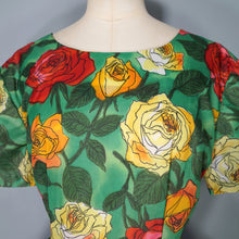 Load image into Gallery viewer, 60s COLOURFUL BRIGHT GREEN RED AND ORANGE BIG ROSE PRINT PLEATED DRESS - L / VOLUP