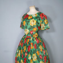 Load image into Gallery viewer, 60s COLOURFUL BRIGHT GREEN RED AND ORANGE BIG ROSE PRINT PLEATED DRESS - L / VOLUP