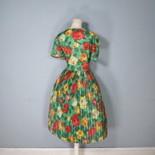 Load image into Gallery viewer, 60s COLOURFUL BRIGHT GREEN RED AND ORANGE BIG ROSE PRINT PLEATED DRESS - L / VOLUP