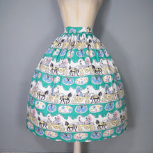 Load image into Gallery viewer, 50s GREEN NOVELTY FULL COTTON SKIRT WITH HORSE DRAWN CARRIAGE PRINT - 26&quot;