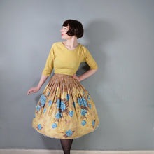 Load image into Gallery viewer, 50s NOVELTY MILLWORTH "VIE EN ROSE" BLUE ROSE AND GLASS VASE FLORAL PRINT BORDER FULL SKIRT - 26.5"