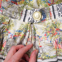 Load image into Gallery viewer, 50s WHITE COTTON FULL SKIRT WITH SCENIC PASTEL VILLAGE STREET PRINT - 25"