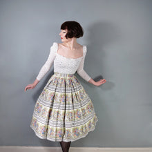 Load image into Gallery viewer, 50s WHITE COTTON FULL SKIRT WITH SCENIC PASTEL VILLAGE STREET PRINT - 25"