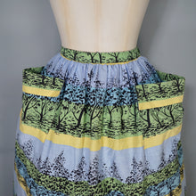Load image into Gallery viewer, 50s GREEN YELLOW AND BLUE TREE / FOREST PRINT SKIRT WITH BIG POCKETS - 29&quot;