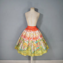 Load image into Gallery viewer, 50s RED AND LIME GREEN PAINTERLY VILLAGE PRINT NOVELTY COTTON FULL SKIRT - 25"