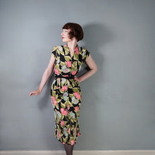 Load image into Gallery viewer, 40s BLACK WITH FLURO PINK, GREEN AND TURQUOISE FLORAL RAYON JERSEY PEPLUM DRESS - XS-S