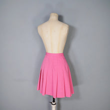 Load image into Gallery viewer, 60s CANDY PINK PLEATED MINI BUTTON THROUGH SKIRT - 26&quot;