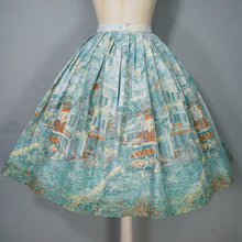 Load image into Gallery viewer, 50s 60s GREEN AND BLUE IMPRESSIONIST VILLAGE LANDSCAPE NOVELTY PRINT SKIRT - 25"