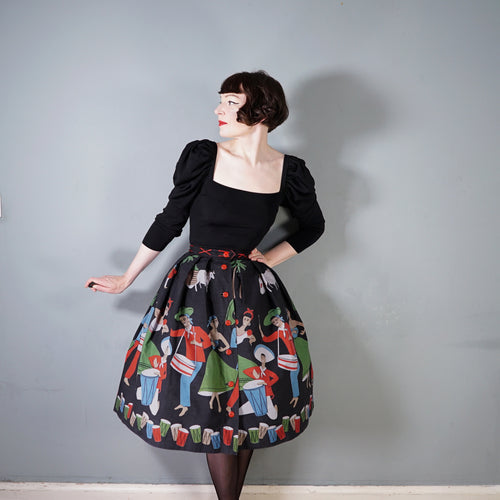50s BLACK NOVELTY DANCERS AND DRUMMERS BORDER PRINT SKIRT - S
