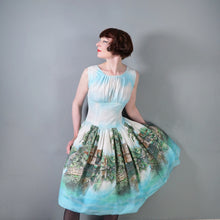 Load image into Gallery viewer, 50s LIGHT BLUE SCENIC BORDER RIVERSIDE VILLAGE PRINT DRESS - S