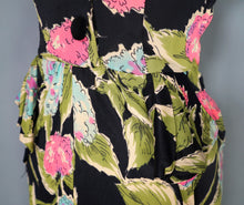 Load image into Gallery viewer, 40s BLACK WITH FLURO PINK, GREEN AND TURQUOISE FLORAL RAYON JERSEY PEPLUM DRESS - XS-S