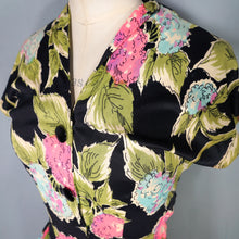 Load image into Gallery viewer, 40s BLACK WITH FLURO PINK, GREEN AND TURQUOISE FLORAL RAYON JERSEY PEPLUM DRESS - XS-S