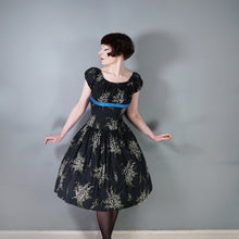 Load image into Gallery viewer, 50s BETTY LO BLACK FLORAL DRESS WITH FULL SKIRT AND SHELF BUST - M