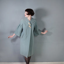 Load image into Gallery viewer, 50s 60s SURREALIST BLUE-GREY WOOL SWING COAT WITH FACE BROOCHES - S-M