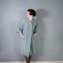 Load image into Gallery viewer, 50s 60s SURREALIST BLUE-GREY WOOL SWING COAT WITH FACE BROOCHES - S-M