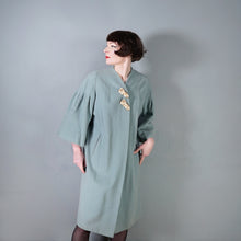 Load image into Gallery viewer, 50s 60s SURREALIST BLUE-GREY WOOL SWING COAT WITH FACE BROOCHES - S-M