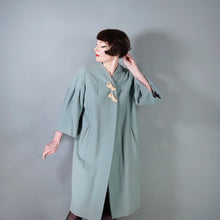 Load image into Gallery viewer, 50s 60s SURREALIST BLUE-GREY WOOL SWING COAT WITH FACE BROOCHES - S-M
