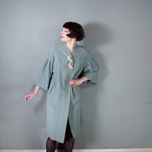 Load image into Gallery viewer, 50s 60s SURREALIST BLUE-GREY WOOL SWING COAT WITH FACE BROOCHES - S-M
