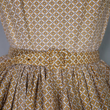 Load image into Gallery viewer, 50s VICTOR JOSSELYN BROWN AND YELLOW PAISELY PRINT FULL SKIRTED DRESS S-M