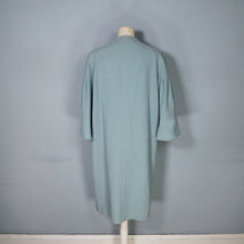 Load image into Gallery viewer, 50s 60s SURREALIST BLUE-GREY WOOL SWING COAT WITH FACE BROOCHES - S-M