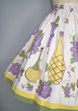 Load image into Gallery viewer, 50s WINE BOTTLE AND GRAPE BORDER PRINT WHITE COTTON FULL SKIRT - 26"