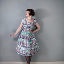 Load image into Gallery viewer, 50s PURPLE PINK ANG TURQUOISE SCENIC EUROPEAN SNAPSHOTS NOVELTY DRESS - M